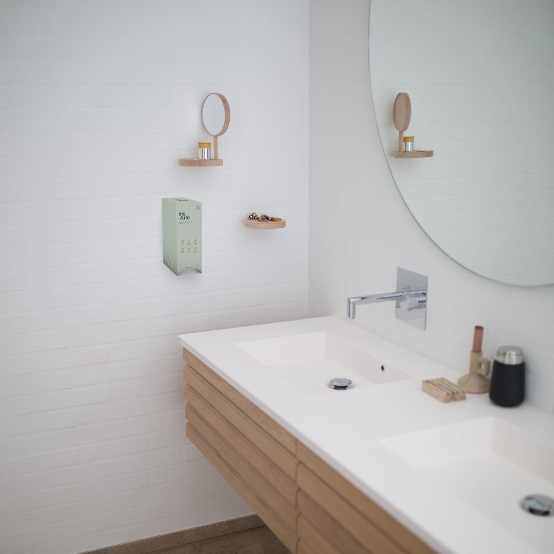 Iris + Arlo Mural Cardboard Dispenser, Daily Pads in a corporate bathroom